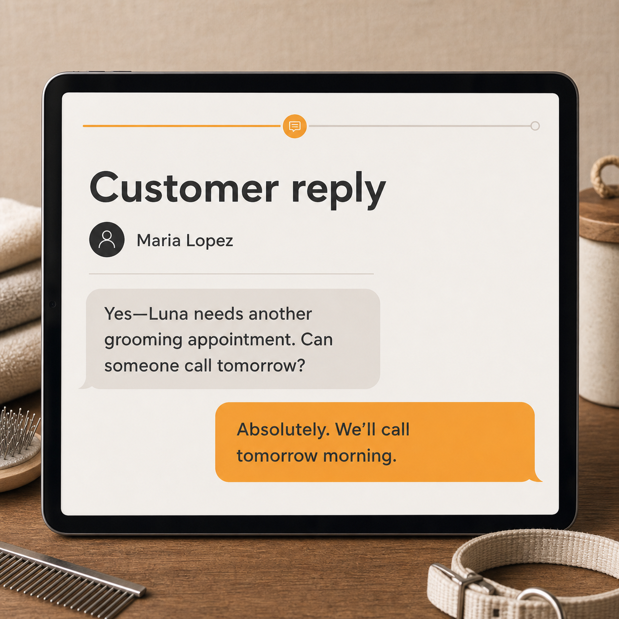 Pet-grooming customer reply and business response shown on a shared tablet