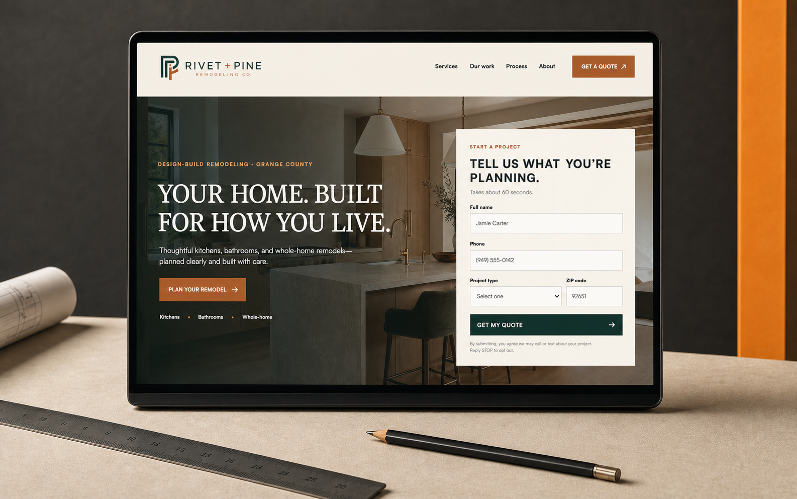 A realistic Rivet and Pine remodeling website displayed on a monitor